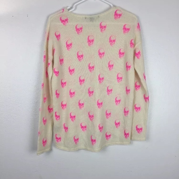 pink skull sweater